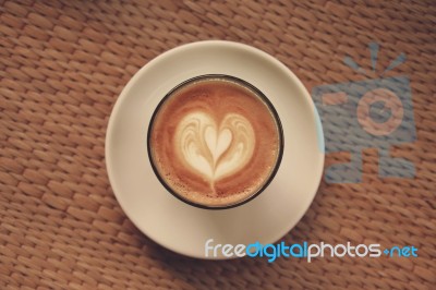 Coffee Latte Art On Tablecloth Texture Background Stock Photo