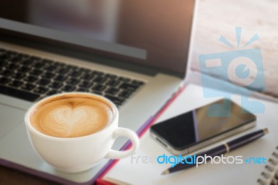 Coffee Latte On Work Table Stock Photo