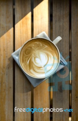 Coffee Latte With On Wooden Table Stock Photo