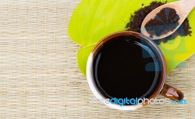 Coffee Lover.coffee Cup On Green Leaf With Roasted Coffee On Woo… Stock Photo