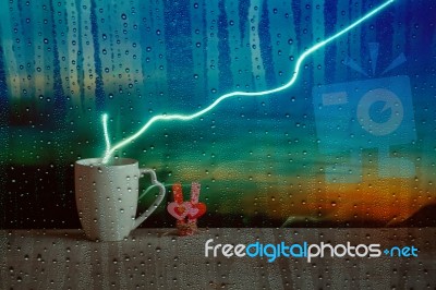 Coffee Mugs With Hearts Looking Through Glass Stock Photo