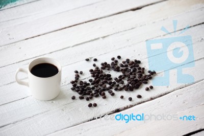 Coffee On White Wooden Panel Stock Photo