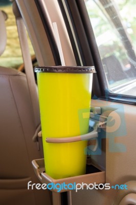 Coffee Or Tea Mugs Green Placed On The Vehicle Console In Modern Luxury Car Interior Stock Photo