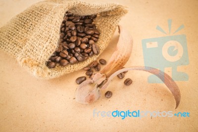 Coffee Roasted Bean On Wooden Table Vintage Style Stock Photo