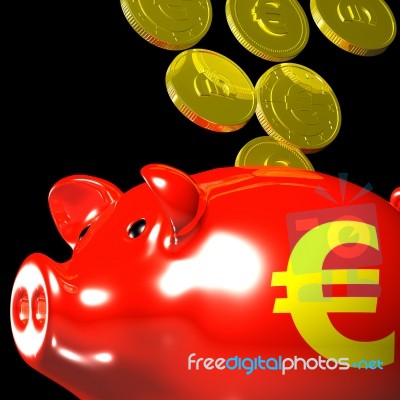 Coins Entering Piggybank Shows European Deposits Stock Image