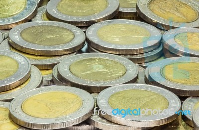 Coins Of Thailand. Wat Arun Temple In Bangkok, Thailand, Depicted In The Thai Ten Baht Coin Stock Photo