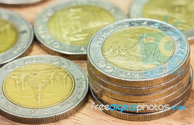 Coins Of Thailand. Wat Arun Temple In Bangkok, Thailand, Depicted In The Thai Ten Baht Coin Stock Photo