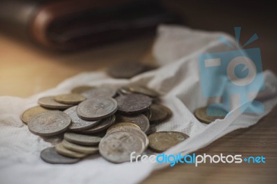 Coins On A Paper Stock Photo