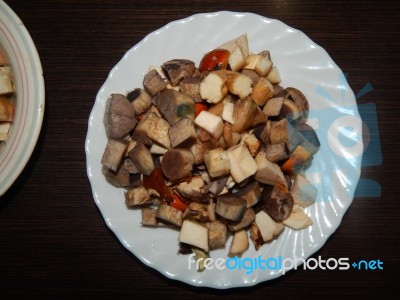 Collection And Preparation Of Autumn Edible Mushrooms  Stock Photo