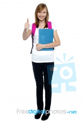 College Going Blonde Showing Thumbs Up Sign Stock Photo