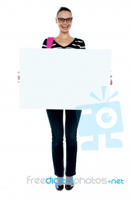 College Student Holding White Board Stock Photo