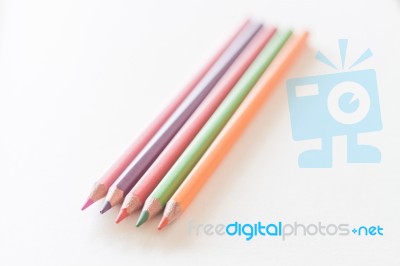 Color Pencils On Wooden Background Stock Photo