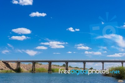 Colorado River Bridge Under Blue Sky Stock Photo