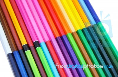 Colored Pencils On White Background Stock Photo