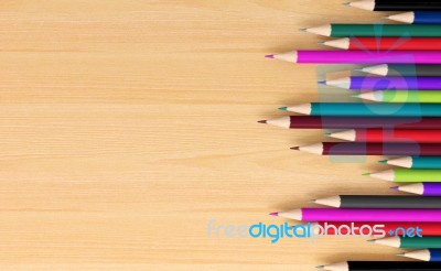 Colored Pencils On Wooden Board Stock Image