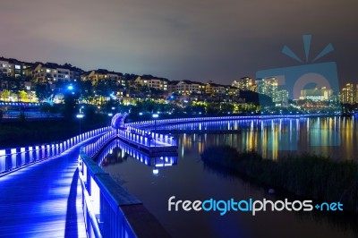 Colorful Bridge And Cityscape At Night In Korea Stock Photo