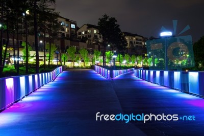 Colorful Bridge And Cityscape At Night In Korea Stock Photo