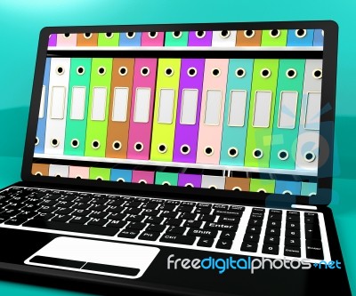 Colorful Files With Laptop Stock Image