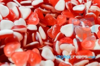 Colorful Heart Shape Jelly Candy Snack Group. Sweet For Valentines Day Background Stock Photo