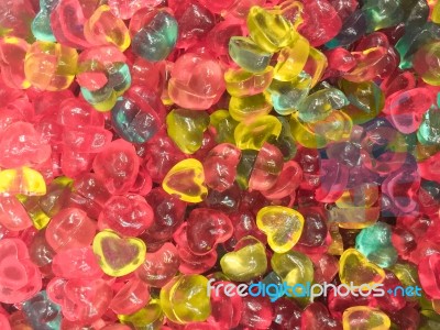 Colorful Heart Shape Jelly Candy Snack Group. Sweet For Valentines Day Background Stock Photo