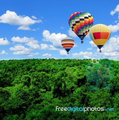 Colorful Hot Air Balloons Flying High Stock Photo