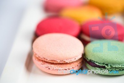 Colorful Macaroons On White Background. Macaron Or Macaroon Is S… Stock Photo