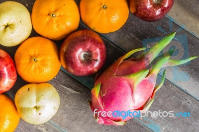 Colorful Of Fruits On Wooden Stock Photo