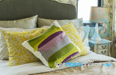 Colorful Pillows On Bed Stock Photo