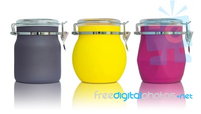 Colorful Plastic Jar On Reflect Floor And White Background Stock Photo