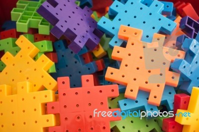 Colorful Plastic Jigsaw Puzzle Game Stock Photo