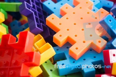 Colorful Plastic Jigsaw Puzzle Game Stock Photo