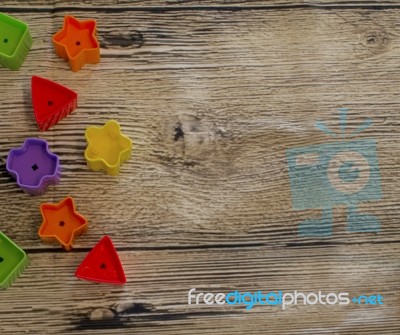 Colorful Shape On Woody Background	 Stock Photo