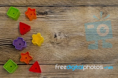 Colorful Shape On Woody Background	 Stock Photo