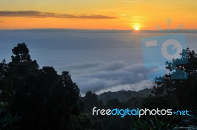 Colorful Sunrise Above The Clouds Stock Photo