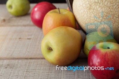 Colors Of Apples On Wooden Stock Photo