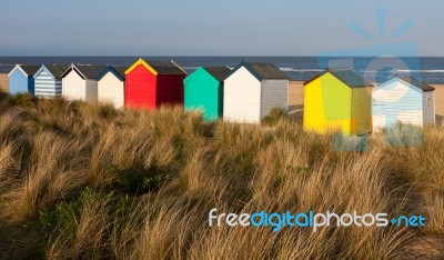 Colourful Beach Huts At Southwold Stock Photo