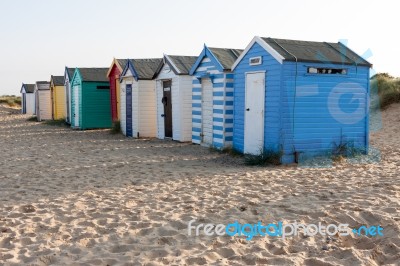 Colourful Beach Huts At Southwold Stock Photo