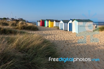 Colourful Beach Huts At Southwold Stock Photo