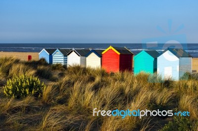 Colourful Beach Huts On Southwold Beach Suffolk Stock Photo