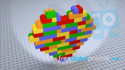 Colourful Heart Bricks Constructed On White Base Stock Image