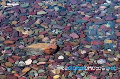 Colourful Stones In Lake Mcdonald Stock Photo