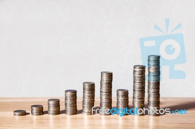 Columns Of Coins On The Table Stock Photo