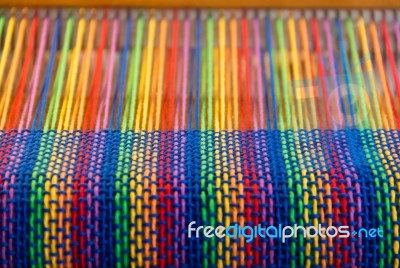 Comb Loom With Rainbow Colors And Diversity Flag Stock Photo