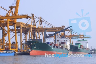 Commercial Ship Loading Container In Shipping Port Image Use For… Stock Photo