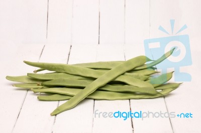 Common Beans On A White Wooden Background Stock Photo