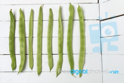 Common Beans On A White Wooden Background Stock Photo