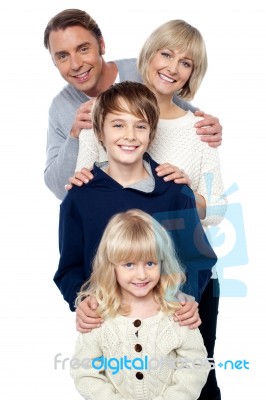 Complete Family. Daughter, Son, Mother And Father Stock Photo