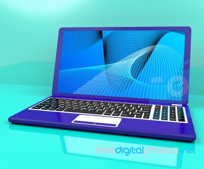 Computer On Desk With Spiral Pattern Stock Image