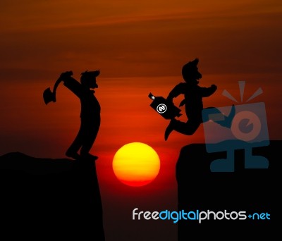 Concept Cartoon Silhouette, Man Hold Axe And  Man Jumping Over P… Stock Image