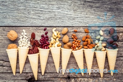 Concept For Homemade Various Nuts Ice Cream. Mixed Nuts In Waffl… Stock Photo